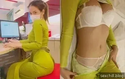 Ang magandang receptionist ng hotel ay nakabihis ng barong.